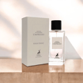 Maison Alhambra L'Impressio Pour Femme — White perfume box and clear glass bottle with black cap, featuring a deer logo and text. | Kotak pewangi putih dan botol kaca jernih bertutup hitam, menampilkan logo rusa dan teks.