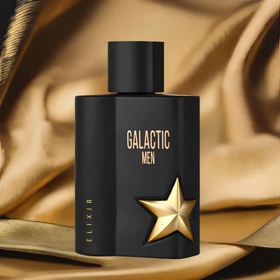 Maison Alhambra Galactic Man Elixir — Black perfume box and bottle with gold star accents and text, set against a white background. | Maison Alhambra Galactic Man Elixir — Kotak dan botol minyak wangi hitam dengan aksen bintang emas dan teks, berlatar belakang putih.