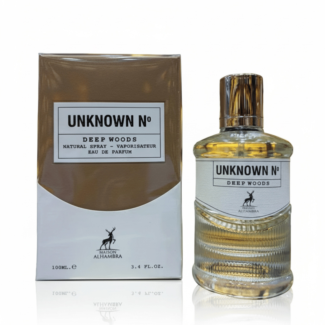 Maison Alhambra Unknown No Deep Woods — A boxed perfume set with the perfume bottle standing next to its brown and white packaging. | Maison Alhambra Unknown No Deep Woods — Set wangian berbungkus dengan botol minyak wangi berdiri di sebelah pembungkus coklat dan putihnya.
