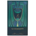 Maison Alhambra La Charmante by Maison Alhambra 100ml EDP — A perfume bottle with a gold and green peacock-inspired cap and ornate detailing on the front, displayed next to its matching dark teal box with art deco-inspired patterns and a deer emblem. | Maison Alhambra La Charmante by Maison Alhambra 100ml EDP — Botol