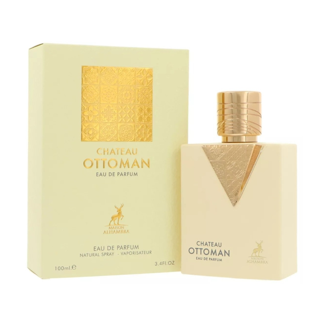 Maison Alhambra Chateau Ottoman — A light cream-colored perfume box and bottle are displayed against a white background. The box features a gold embossed geometric pattern and the product name. The bottle has a gold cap and a gold embossed geometric design on the front. | Maison Alhambra Chateau Ottoman — Kotak dan