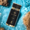 Maison Alhambra Sceptre Oceana — Black perfume bottle with gold accents and a blue, marbled box with gold trim, featuring a deer logo. | Maison Alhambra Sceptre Oceana — Botol minyak wangi hitam dengan aksen emas dan kotak biru berjalak emas, menampilkan logo rusa.