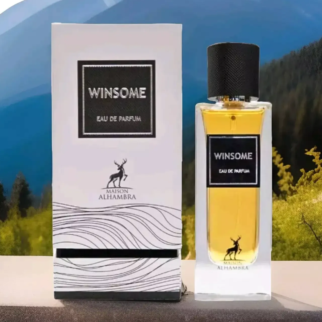 Maison Alhambra Winsome by Maison Alhambra 90ml EDP — A white box with black text and a deer logo sits next to a clear glass perfume bottle with yellow liquid and a black cap, displayed on a black and white tiered stand. | Maison Alhambra Winsome by Maison Alhambra 90ml EDP — Kotak putih dengan teks hitam dan logo