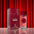 Maison Alhambra Camille by Maison Alhambra 100ml EDP — A clear glass perfume bottle with a rose-shaped maroon cap and a maroon rose design on the front, next to its matching maroon box with gold accents and text. | Maison Alhambra Camille by Maison Alhambra 100ml EDP — Botol minyak wangi kaca jernih dengan penutup