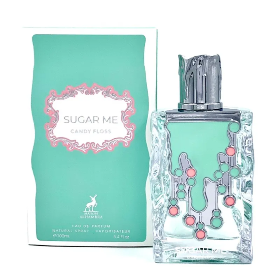 Maison Alhambra Sugar Me Candy Floss — A clear glass perfume bottle with a mint green liquid and a decorative silver and pink candy floss design, next to its matching mint green box with the same design. | Maison Alhambra Sugar Me Candy Floss — Botol kaca jernih dengan cecair hijau pudina dan reka bentuk gula-gula
