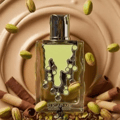 Maison Alhambra Sugar Me Pistachio Chocolate by Maison Alhambra 100ml EDP — A light green perfume bottle with a decorative, dripping design and dark accents, next to its matching light green box with ornate framing and text. | Maison Alhambra Sugar Me Pistachio Chocolate by Maison Alhambra 100ml EDP — Botol minyak