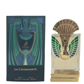 Maison Alhambra La Charmante by Maison Alhambra 100ml EDP — A perfume bottle with a gold and green peacock-inspired cap and ornate detailing on the front, displayed next to its matching dark teal box with art deco-inspired patterns and a deer emblem. | Maison Alhambra La Charmante by Maison Alhambra 100ml EDP — Botol