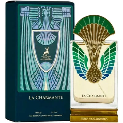Maison Alhambra La Charmante by Maison Alhambra 100ml EDP — A perfume bottle with a gold and green peacock-inspired cap and ornate detailing on the front, displayed next to its matching dark teal box with art deco-inspired patterns and a deer emblem. | Maison Alhambra La Charmante by Maison Alhambra 100ml EDP — Botol