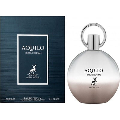 Maison Alhambra Aquilo Pour Homme — A dark blue textured box is shown next to a round, silver and gradient brown perfume bottle with a silver ring cap. | Maison Alhambra Aquilo Pour Homme — Kotak biru gelap bertekstur ditunjukkan di sebelah botol minyak wangi bulat, perak dan coklat gradien dengan penutup cincin perak.