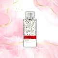 Maison Alhambra Aromatic Rouge by Maison Alhambra 100ml EDP — A clear glass perfume bottle with a white label featuring a delicate floral pattern of black branches and red berries, set against a soft pink watercolor background with gold accents. | Maison Alhambra Aromatic Rouge by Maison Alhambra 100ml EDP — Botol