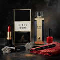 Maison Alhambra B.A.D. Femme Eau de Parfum — A red lipstick, a bottle of B.A.D. Femme perfume, and a red nail polish are arranged on a dark marble surface with gold glitter and decorative silver flowers. | Maison Alhambra B.A.D. Femme Eau de Parfum — Gincu merah, sebotol minyak wangi B.A.D. Femme, dan pengilat kuku