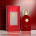 Maison Alhambra Philos Rosso — Red velvet perfume bottle and matching red textured box with gold accents, displayed on a reflective surface. | Maison Alhambra Philos Rosso — Botol minyak wangi baldu merah dan kotak merah bertekstur yang sepadan dengan aksen emas, dipamerkan di permukaan reflektif.
