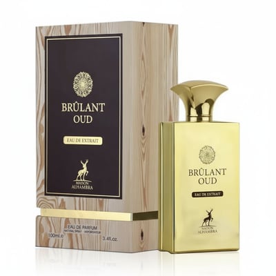 Maison Alhambra Brulant Oud — A gold-colored perfume bottle and its wooden-patterned box are displayed against a white background. The box features a dark brown label with gold text and a deer silhouette. | Maison Alhambra Brulant Oud — Botol minyak wangi berwarna emas dan kotaknya yang bermotif kayu dipaparkan