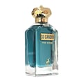 Maison Alhambra Candid Pour Homme — A clear glass perfume bottle with teal liquid, a gold faceted crown-like cap, and a gold label reading "SO CANDID POUR HOMME" with a small gold deer emblem at the bottom. | Botol minyak wangi kaca jernih dengan cecair teal, penutup emas berbentuk mahkota faset, dan label emas