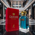Maison Alhambra Candid Pour Homme — Red velvet box and blue glass perfume bottle with gold cap on a marble surface, mall interior background | Maison Alhambra Candid Pour Homme — Kotak baldu merah dan botol minyak wangi kaca biru dengan penutup emas di atas permukaan marmar, latar belakang dalaman pusat membeli-belah