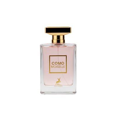 Maison Alhambra Como Moiselle by Maison Alhambra 100ml for Her — A clear glass perfume bottle with light pink liquid, a gold cap, and a gold label featuring the text "COMO MOISELLE" and a deer silhouette. | Maison Alhambra Como Moiselle by Maison Alhambra 100ml for Her — Botol minyak wangi kaca jernih dengan cecair