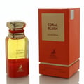Maison Alhambra Coral Blush by Maison Alhambra 80ml EDP — A perfume bottle with a red base and yellow liquid, topped with a gold cap, sits next to its orange box with a gold label. | Maison Alhambra Coral Blush by Maison Alhambra 80ml EDP — Botol minyak wangi dengan tapak merah dan cecair kuning, di atasnya bertudung