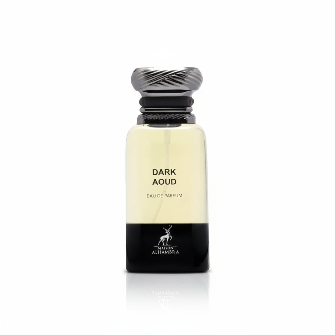 Maison Alhambra Dark Aoud by Maison Alhambra 80ml EDP — A clear glass perfume bottle with a black base and a silver textured cap, showing light yellow liquid inside, against a white background. | Maison Alhambra Dark Aoud by Maison Alhambra 80ml EDP — Botol minyak wangi kaca jernih dengan tapak hitam dan penutup