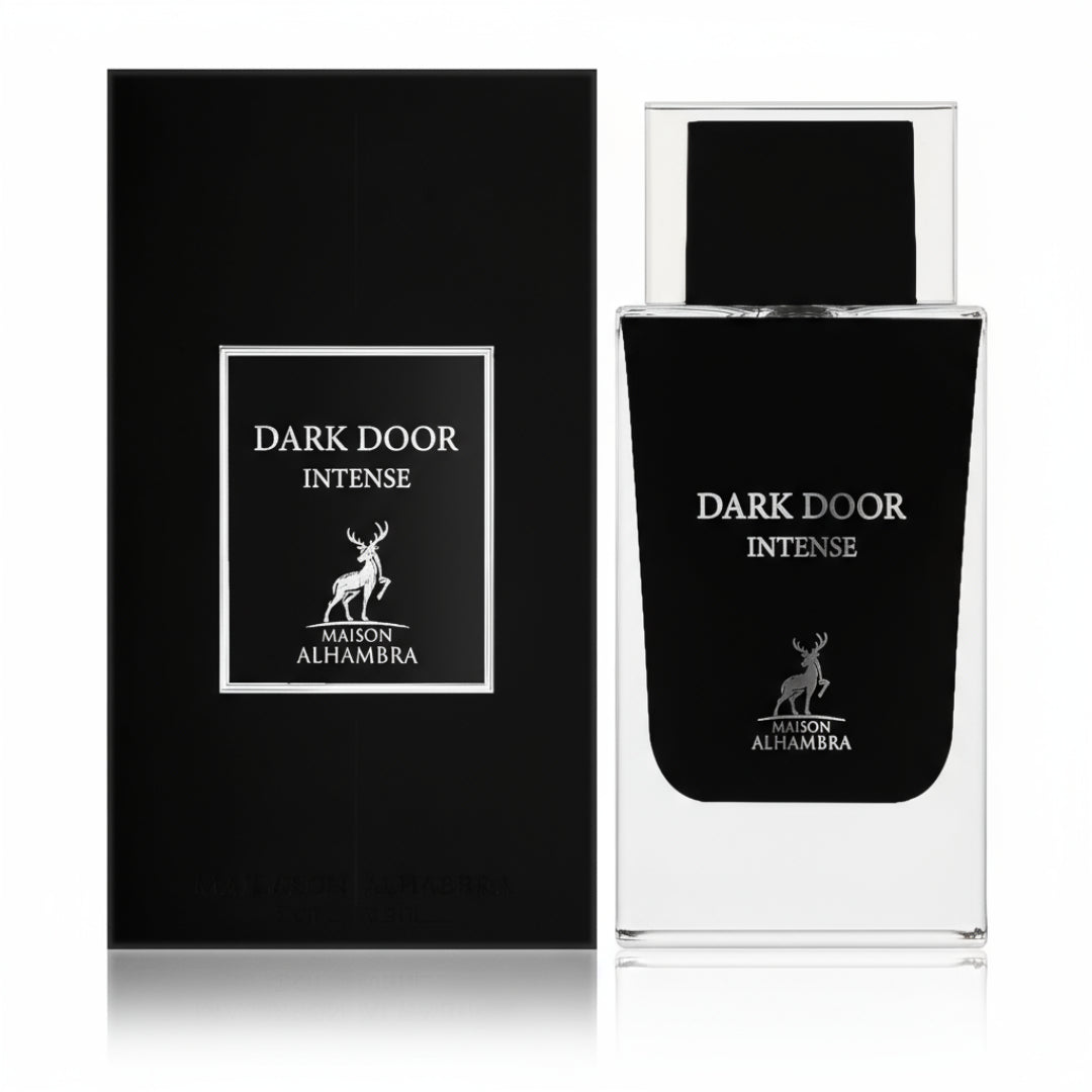 Maison Alhambra Dark Door Intense — A black perfume box is shown next to a clear glass bottle with a black cap and label, featuring a deer logo and text. | Kotak minyak wangi hitam ditunjukkan di sebelah botol kaca jernih dengan penutup dan label hitam, menampilkan logo rusa dan teks.