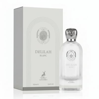 Maison Alhambra Delilah Blanc — White perfume box and frosted glass bottle with silver cap, featuring embossed crest and deer logo. | Maison Alhambra Delilah Blanc — Kotak minyak wangi putih dan botol kaca beku dengan penutup perak, menampilkan lambang timbul dan logo rusa.