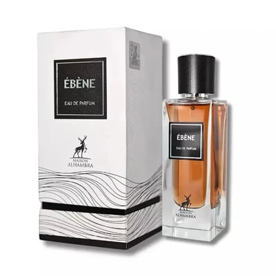 Maison Alhambra Ebene by Maison Alhambra Perfume 90 ml EDP — A white box with black text and a deer logo stands next to a clear glass perfume bottle with amber liquid and a black cap. | Maison Alhambra Ebene by Maison Alhambra Perfume 90 ml EDP — Kotak putih dengan teks hitam dan logo rusa berdiri di sebelah botol