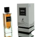 Maison Alhambra Ebene by Maison Alhambra Perfume 90 ml EDP — A clear glass perfume bottle with amber liquid and a black cap, next to its white and black patterned box, both featuring the brand logo and product name. | Maison Alhambra Ebene by Maison Alhambra Perfume 90 ml EDP — Botol kaca jernih dengan cecair perang