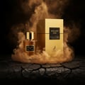 Maison Alhambra Exclusif Oud — A golden perfume bottle and its matching box are surrounded by wisps of golden smoke, set against a dark, cracked earth background. | Maison Alhambra Exclusif Oud — Botol minyak wangi keemasan dan kotak padanannya dikelilingi oleh kepulan asap keemasan, berlatarkan tanah gelap yang
