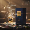 Maison Alhambra Exclusif Saffron – A clear glass perfume bottle with a golden liquid, adorned with butterfly-like wings, surrounded by splashing liquid and smoke, with scent notes of guaiac wood, vanilla, and leather labeled. Next to it is a dark blue box. | Maison Alhambra Exclusif Saffron – Botol minyak wangi kaca