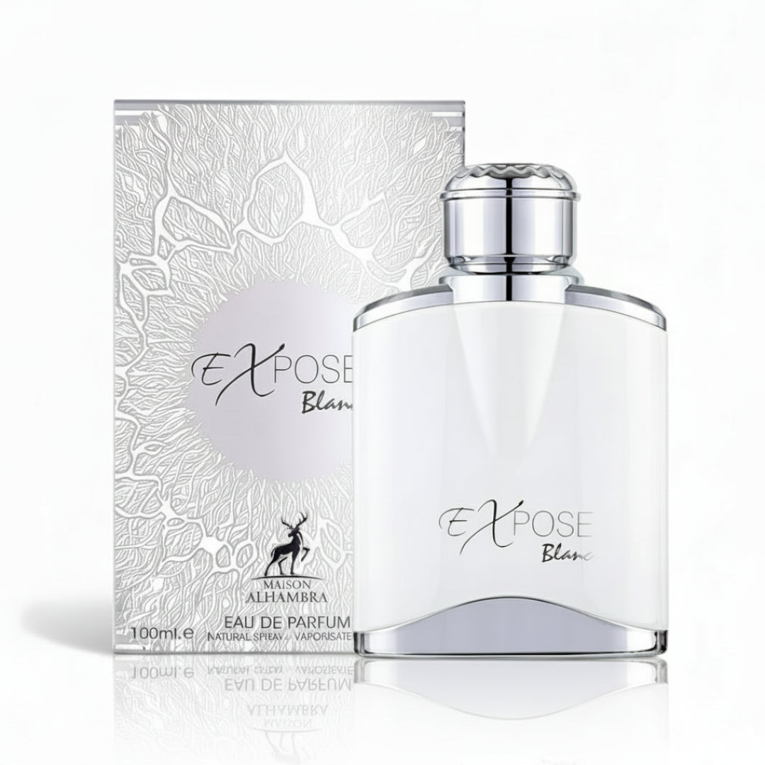 Maison Alhambra Expose Blanc by Maison Alhambra 100ml EDP Men — A white perfume bottle and its matching box with intricate silver line art, set against a white background with a subtle reflection. | Maison Alhambra Expose Blanc by Maison Alhambra 100ml EDP Men — Botol minyak wangi putih dan kotaknya yang sepadan