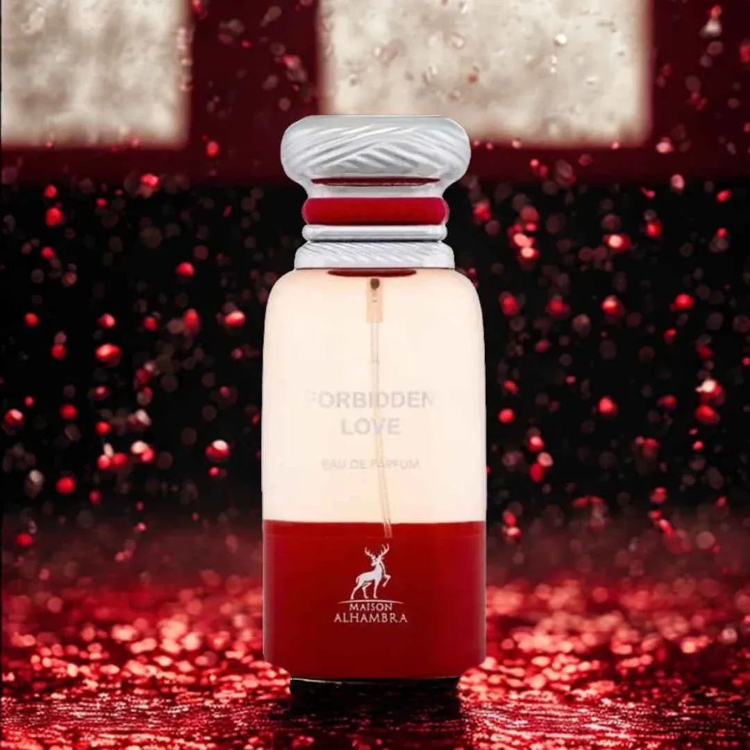 Maison Alhambra Forbidden Love — A clear and red glass perfume bottle with a silver and red cap, set against a dark, sparkling red background. | Maison Alhambra Forbidden Love — Botol kaca jernih dan merah dengan penutup perak dan merah, diletakkan di atas latar belakang merah gelap yang berkilauan.