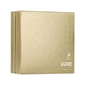 Maison Alhambra Luxe Gold by Maison Alhambra – 100 ml Unisex — A gold-embossed perfume box with concentric circles pattern and embossed text "Luxe". | Maison Alhambra Luxe Gold by Maison Alhambra – 100 ml Unisex — Kotak minyak wangi bertekstur emas dengan corak bulatan sepusat dan teks timbul "Luxe".