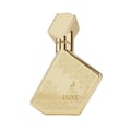 Maison Alhambra Luxe Gold by Maison Alhambra – 100 ml Unisex — A golden, faceted perfume bottle with intricate circular patterns and a deer emblem, set against a white background. | Maison Alhambra Luxe Gold by Maison Alhambra – 100 ml Unisex — Botol minyak wangi emas berfaset dengan corak bulat yang rumit dan lambang