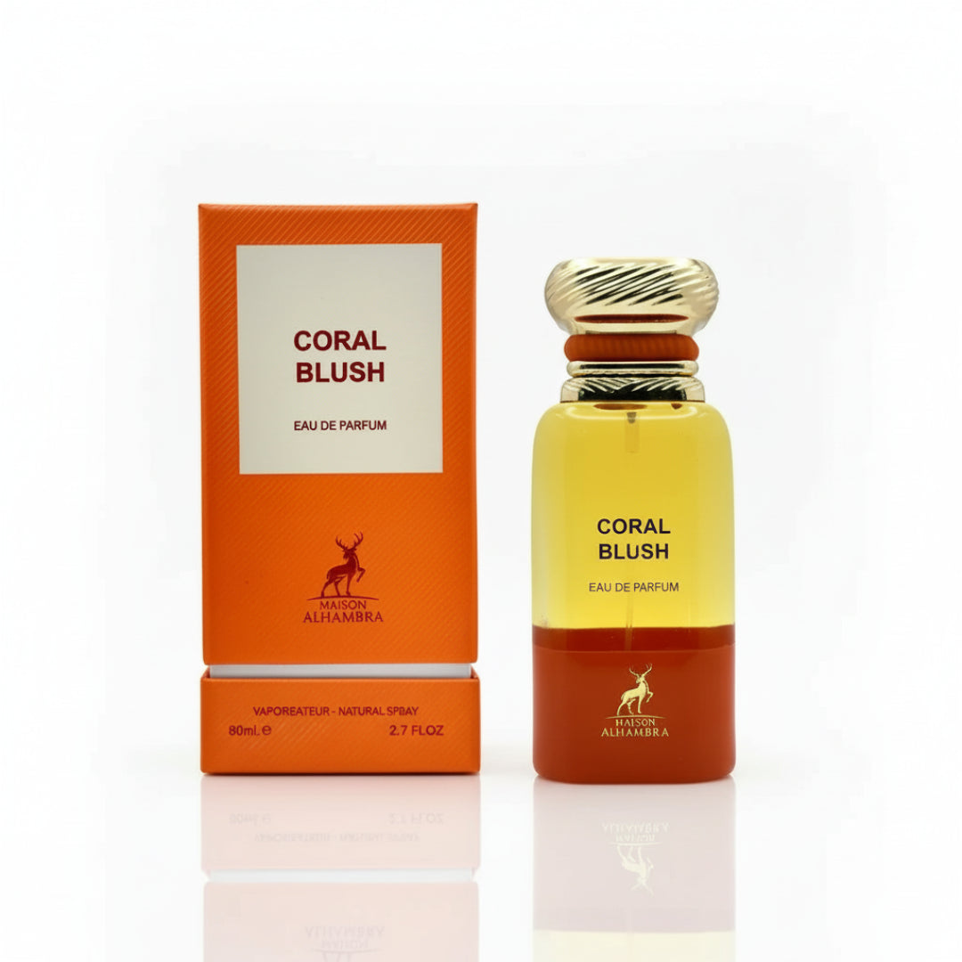 Maison Alhambra Coral Blush 80ml EDP — A bottle of Coral Blush Eau de Parfum by Maison Alhambra stands next to its matching orange box on a white background. | Maison Alhambra Coral Blush 80ml EDP — Sebotol Coral Blush Eau de Parfum oleh Maison Alhambra berdiri di sebelah kotak orennya yang sepadan di atas latar