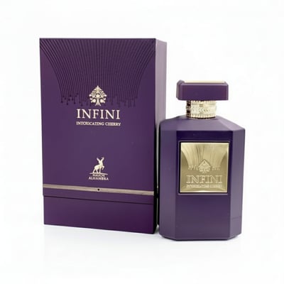 Maison Alhambra Infini Intoxicating Cherry — A deep purple perfume box and bottle with gold accents, featuring intricate patterns and the brand's logo. | Maison Alhambra Infini Intoxicating Cherry — Kotak dan botol minyak wangi ungu gelap dengan aksen emas, menampilkan corak rumit dan logo jenama.