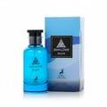 Maison Alhambra Jean Lowe Azure — A blue glass perfume bottle with a black cap stands next to its blue and white gradient box, featuring a deer logo and text. | Maison Alhambra Jean Lowe Azure — Botol kaca biru dengan penutup hitam berdiri di sebelah kotak gradien biru dan putihnya, menampilkan logo rusa dan teks.