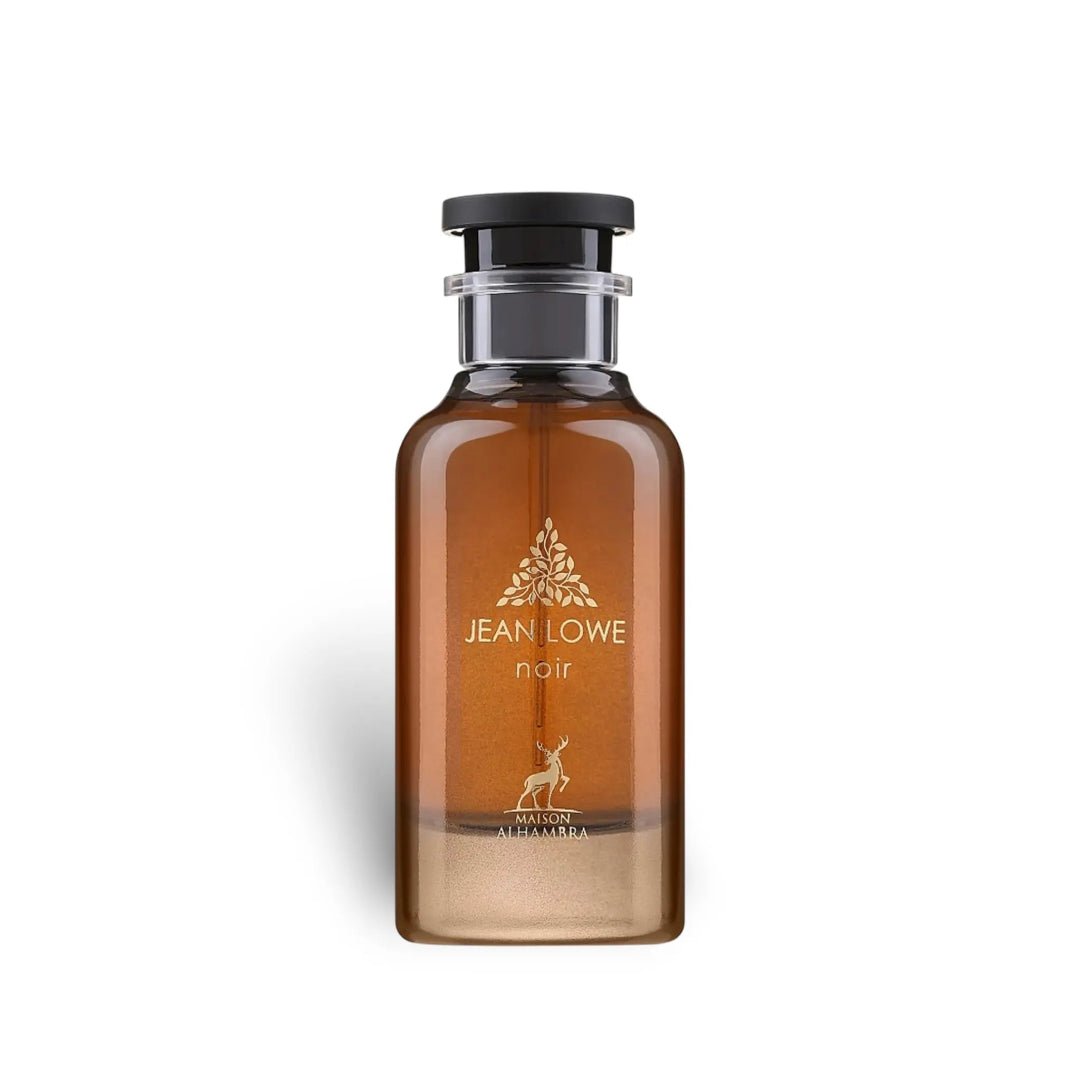 Maison Alhambra Jean Lowe Noir — Amber glass perfume bottle with a black cap and gold leaf emblem and deer silhouette on a white background. | Maison Alhambra Jean Lowe Noir — Botol minyak wangi kaca berwarna ambar dengan penutup hitam dan lambang daun emas serta siluet rusa di atas latar belakang putih.