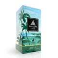 Maison Alhambra Jean Lowe Vibe — A perfume box with a tropical beach scene, featuring palm trees and a blue sky with clouds. | Maison Alhambra Jean Lowe Vibe — Kotak minyak wangi dengan pemandangan pantai tropika, menampilkan pokok kelapa dan langit biru dengan awan.