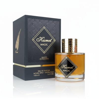 Maison Alhambra Kismet Magic by Maison Alhambra 100ml EDP Unisex — A dark patterned box with gold accents stands next to a clear glass perfume bottle filled with amber liquid, both featuring gold diamond-shaped labels with the brand and product name. | Maison Alhambra Kismet Magic by Maison Alhambra 100ml EDP Unisex —