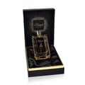 Maison Alhambra Kismet For Men by Maison Alhambra 100ml Man — A rectangular glass perfume bottle with gold accents and a textured cap, presented in an open black gift box lined with black satin and a gold rim. | Maison Alhambra Kismet For Men by Maison Alhambra 100ml Man — Botol minyak wangi kaca segi empat dengan