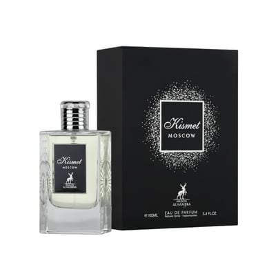 Maison Alhambra Kismet Moscow by Maison Alhambra 100ml EDP — A clear glass perfume bottle with a silver cap sits next to its black packaging box, which features a sparkly white design and the product name. | Maison Alhambra Kismet Moscow by Maison Alhambra 100ml EDP — Botol minyak wangi kaca jernih dengan penutup