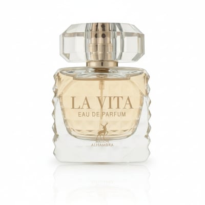 Maison Alhambra La Vita EDP — A clear glass perfume bottle with a faceted geometric design on the sides and a faceted clear cap. The liquid inside is pale yellow. A small deer silhouette is printed on the front. | Maison Alhambra La Vita EDP — Botol kaca jernih dengan rekaan geometri berfaset di sisi dan penutup