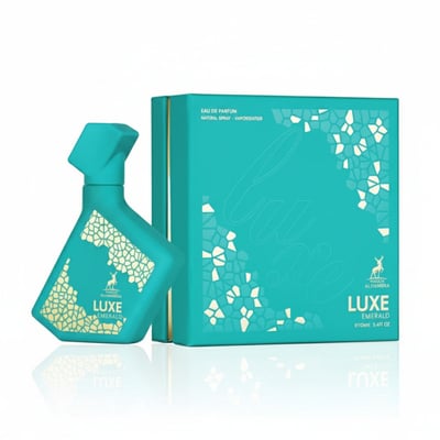 Maison Alhambra Luxe Emerald Perfume Maison Alhambra 100ml Unisex — A teal perfume bottle with a gold geometric pattern sits next to its matching teal box, also with gold geometric accents. | Maison Alhambra Luxe Emerald Perfume Maison Alhambra 100ml Unisex — Botol minyak wangi teal dengan corak geometri emas terletak