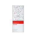 Maison Alhambra Aromatic Rouge — White perfume bottle with a floral pattern of grey branches and red flowers, and a red band with white text "AROMATIC ROUGE" | Maison Alhambra Aromatic Rouge — Botol minyak wangi putih dengan corak bunga dahan kelabu dan bunga merah, dan jalur merah dengan teks putih "AROMATIC ROUGE"