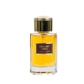 Maison Alhambra Exclusif Tabac – A clear glass perfume bottle with golden cap and a golden label featuring the text "EXCLUSIF TABAC" and "MAISON ALHAMBRA COLLECTION". The liquid inside is amber-colored. | Maison Alhambra Exclusif Tabac – Botol minyak wangi kaca jernih dengan penutup keemasan dan label keemasan yang