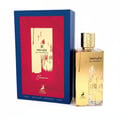 Maison Alhambra Renee Carmine EDP 100 ml — A blue box with red and gold abstract design stands next to a gold-colored perfume bottle with a gold cap. | Maison Alhambra Renee Carmine EDP 100 ml — Kotak biru dengan reka bentuk abstrak merah dan emas berdiri di sebelah botol minyak wangi berwarna emas dengan penutup emas.