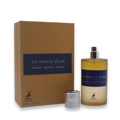 Maison Alhambra The Memory Of Oud EDP 100ml — A brown cardboard box with embossed lines and a dark blue label is shown next to a clear glass perfume bottle with yellow liquid and a silver cap. | Maison Alhambra The Memory Of Oud EDP 100ml — Kotak kadbod coklat dengan garisan timbul dan label biru gelap ditunjukkan di