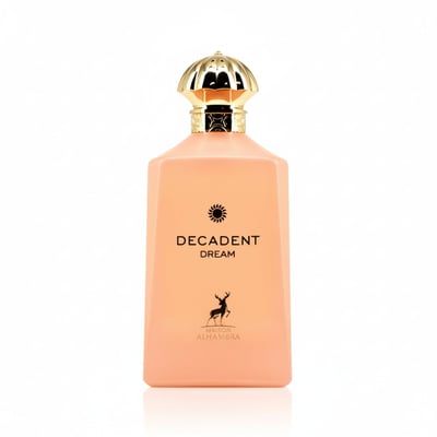 Maison Alhambra Decadent Dream — A peach-colored rectangular perfume bottle with a gold fluted cap, featuring black text 'DECADENT DREAM' and a deer silhouette logo above 'MAISON ALHAMBRA'. | Maison Alhambra Decadent Dream — Botol minyak wangi berbentuk segi empat berwarna pic dengan penutup berlubang emas