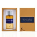 Maison Alhambra The Memory Of Oud EDP 100ml — Perfume bottle in a gold-lined box next to its matching gold textured box with a dark blue label | Maison Alhambra The Memory Of Oud EDP 100ml — Botol minyak wangi dalam kotak berlapisan emas di sebelah kotak bertekstur emas yang sepadan dengan label biru gelap
