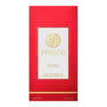 Maison Alhambra Philos Rosso — Red box with gold embossed pattern, featuring a central white label with gold text 'PHILOS' and 'ROSSO', and a circular gold emblem. | Maison Alhambra Philos Rosso — Kotak merah dengan corak emas timbul, menampilkan label putih tengah dengan teks emas 'PHILOS' dan 'ROSSO', serta lambang