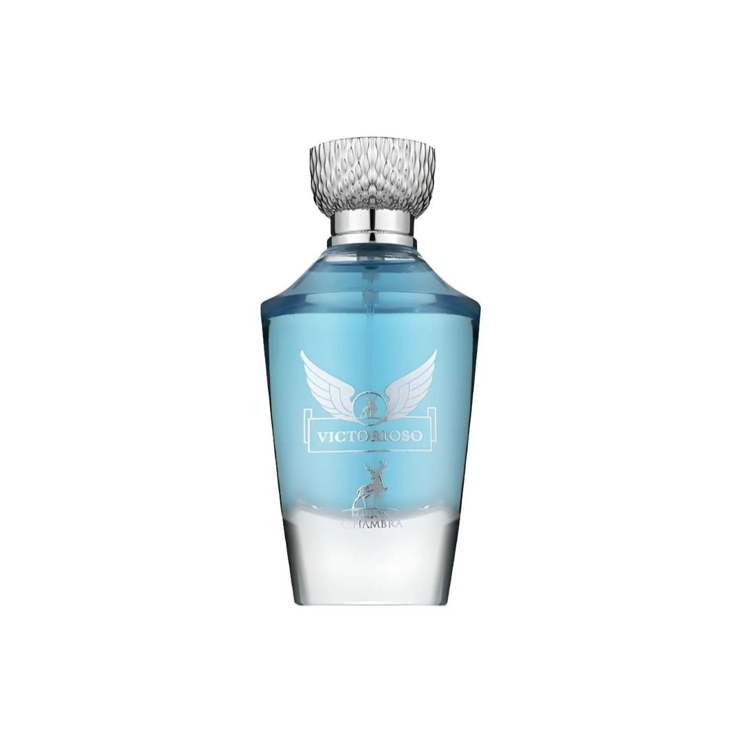 Maison Alhambra Victorioso Legend by Maison Alhambra 100 ml for Men — A clear glass perfume bottle with blue liquid and a silver cap, featuring a winged emblem and a deer silhouette on the label. | Maison Alhambra Victorioso Legend by Maison Alhambra 100 ml for Men — Botol minyak wangi kaca jernih dengan cecair biru
